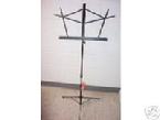 Folding Metal Music Stand Made By STAGELINE. It Reaches 51" Tall So It's Perfect For Any Beginning Musician. We've Tried Alot Of Folding Music Stands, And This One Seems To Be The Most Durable For The Money.