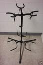 Triple Guitar Stand. It Has A Wide Base, And Can Reach Up To 44" Tall. Rubber Protection On The Base And The Neck Holder.