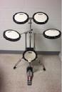 Tunable Training Practice Pad Kit. Each Pad Is 8". It Is Set Up Just Like A 5 Piece Drum Set. This Set Is Suspended On A Heavy Duty Double-Braced Stand. It Also Includes The Bass Drum Pedal, And A Nice Set Of Vic Firth Second Sticks. It Is Fully Adjustable And All In One Piece. This Is Perfect For Practice And Warm Ups.
